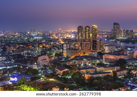Landscape along the river Charoenkrung Road area in Bangkok, Thailand during the at twilight.