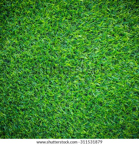 Artificial green grass , artificial turf background and texture.