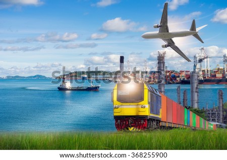 Rail freight, containers, against a backdrop of the Port and commercial aircraft, transport concepts.