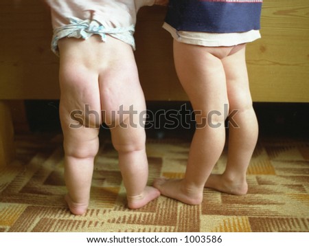 stock photo two kids with naked legs