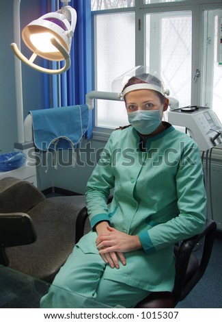 doctor in stomatological office (image contains some noise)