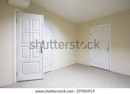 Empty hospital hall with closed doors and human hand