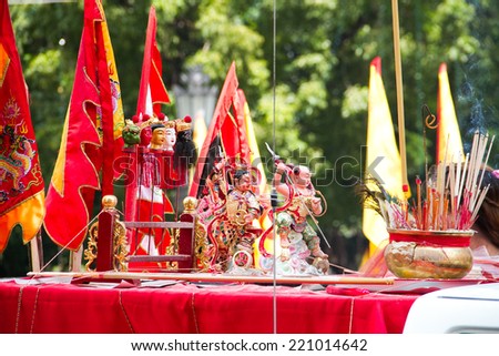 A typical scene of Thai Chinese worshippers waiting for the parade of the Nakonratchasima Vegetarian Festival in Nakonratchasima Town,Nakonratchasima- Thailand on the 28th September, 2014