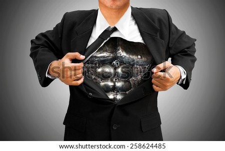 businessman acting like a super hero and tearing his shirt off showing a suit underneath his suit body muscle made from scrap metal