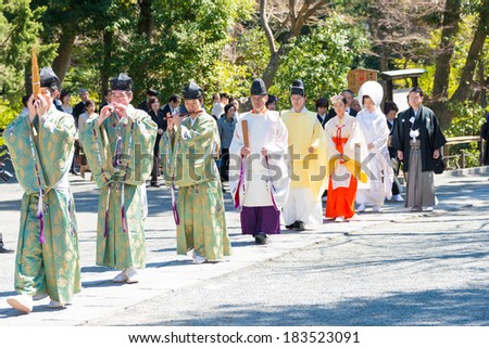 KAMAKURA, JAPAN - MARCH 22 2014: Traditional wedding in Tsurugaoka Hachimangu Shrine. One the most important Shinto shrine in Kamakura and an Important Cultural Property of Japan.
