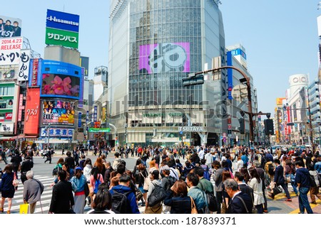 TOKYO, JAPAN - APRIL 17 2014: Shibuya crossing is one of the most famed examples of a scramble crosswalk in the world.