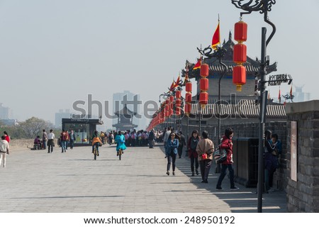 XIAN, CHINA - OCT 23 2014: Visitor at City Wall of Xi'an. a famous Historic Sites in Xian, Shaanxi, China.
