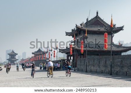 XIAN, CHINA - OCT 23 2014: Visitor at City Wall of Xi\'an. a famous Historic Sites in Xian, Shaanxi, China.