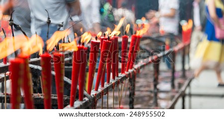 SICHUAN, CHINA - SEP 13 2014: Candle at Lingshan Temple. a famous Temple in Mianning, Xichang, Sichuan, China.