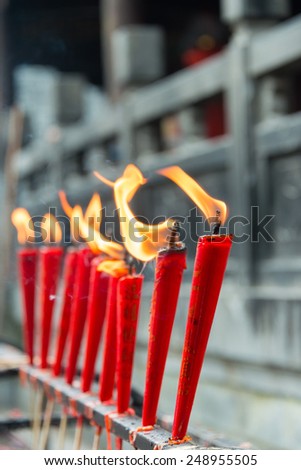 SICHUAN, CHINA - SEP 13 2014: Candle at Lingshan Temple. a famous Temple in Mianning, Xichang, Sichuan, China.