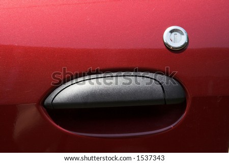 Plastic car door handle on a family car
