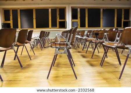Empty classroom. Rows of student chairs in empty university classroom