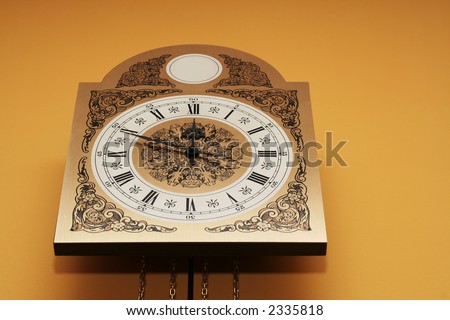Old clock face showing the time.Clock showing midnight or noon time