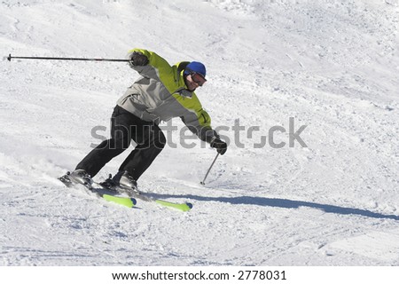Skier on a snow slope in high speed. winter sports concept