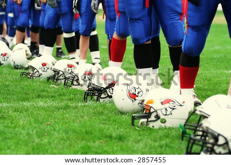 American football equipment - helmet. Sport team concept. Football player boots