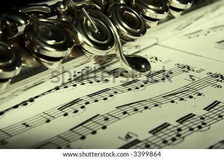 Flute on note background. Classic music concert concept