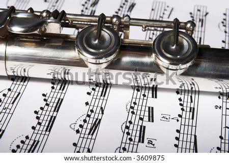 Flute on note background. Classic music concert concept