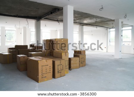 Warehouse building. Storage boxes in industrial warehouse. Logistics concept