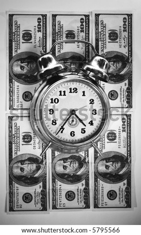 Retro clock on american dollar. Time in money  business concept