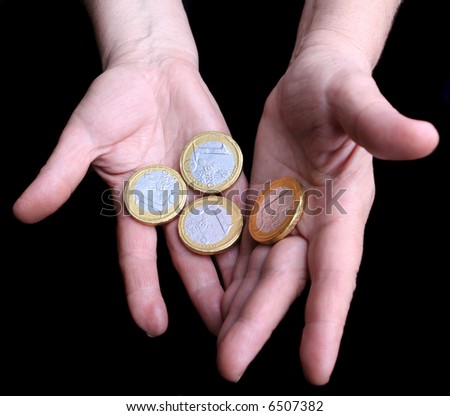 One euro coin money in hands. Business and economy concept