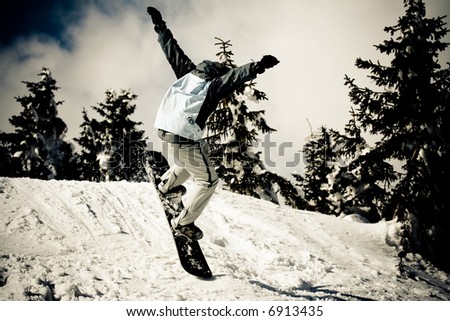 Snowboard in air. Winter sport lifestyle concept