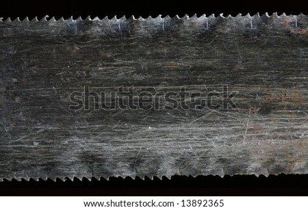 Close up of Saw blades with broken teeth isolated on black. Heavy industry concept