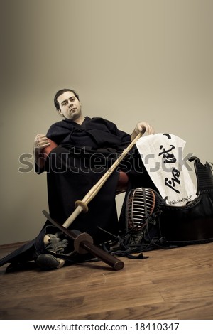 Kendo master portrait with sword - martial art concept