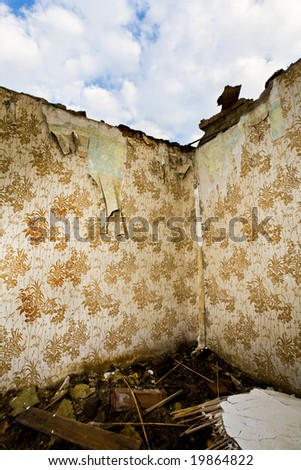 Ruined and destroyed room with retro wallpaper pattern. Two walls with wallpaper ideal for your designs