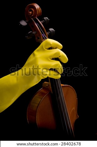 violin and hand in yellow plastic glove. Funky modern music concept