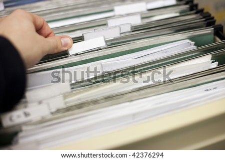 File cabinet with blank file labels ready for your customization