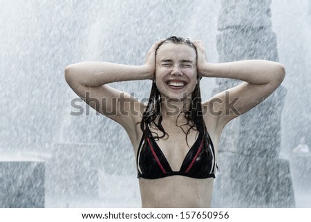 The girl in the water fountains or Enjoy life or Hot day say yes be happy