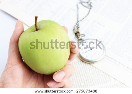 An apple, Apple a day, New idea or Do not waste your time, Time management or Time is money, Healthy lifestyle, Diet food