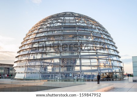 BERLIN GERMANY SEPTEMBER 19: Reichstag dome: Reichstag dome on September 19 2013 in Berlin Germany. Tourists visiting Reichstag dome in the late afternoon.