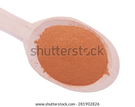 Heap of cat\'s claw plant powder (Uncaria tomentosa) in wooden spoon isolated on white background