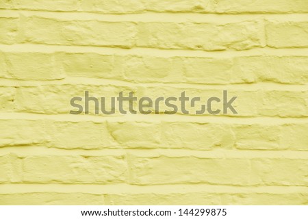 yellow cream painted brick wall background