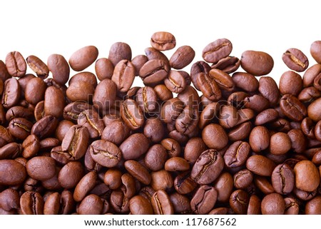 Close up of coffe beans isolated on white(studio shot - not manually isolated), as interesting food background