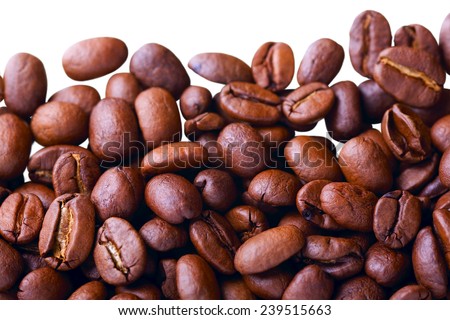 Close up of coffe beans isolated on white(studio shot - not manually isolated), as interesting food background