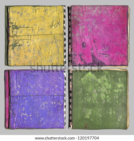 Grunge notebooks design set, four used abstract artistic painted notebook isolated with clipping path.