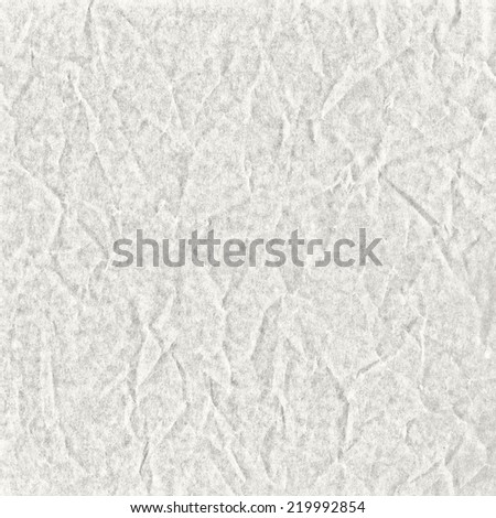 White abstract background from wrinkled wax paper and chalk texture