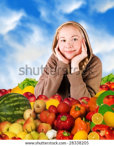 smiling young woman and food (fruits and vegetables)