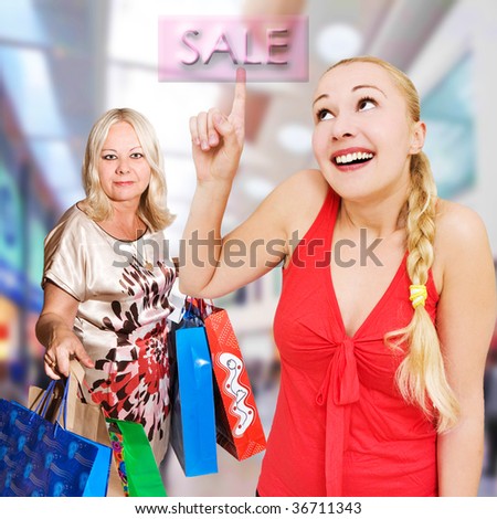 women shopping - 50 and 25 years old