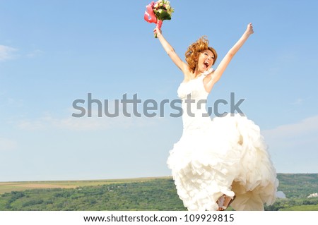 happy bride in a beautiful natural landscape