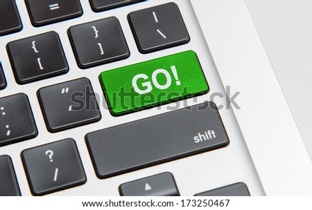 word go written on a green computer keyboard key or button