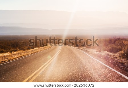 endless asphalt road with blue sky in Big Bend National Park, Texas, USA