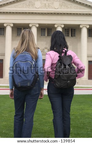 Two students walking to class