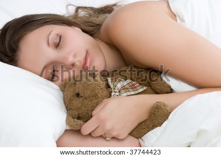 Sleeping Girl Hugging Teddy Bear