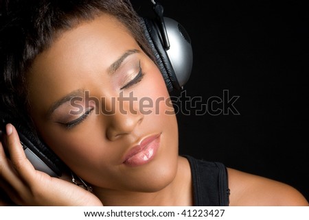 stock photo Black Woman Wearing Headphones