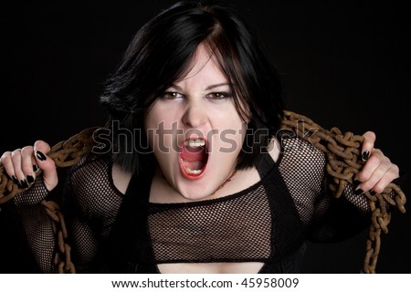 stock photo Yelling Girl in Chains