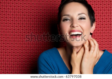 Beautiful smiling laughing young woman