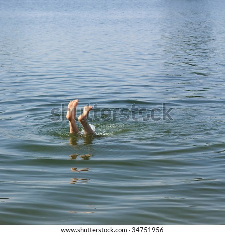 legs lifted above water